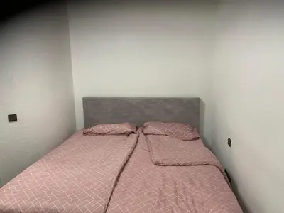 Ein Bett oder Betten in einem Zimmer der Unterkunft KM APPARTS 5 Wesel
