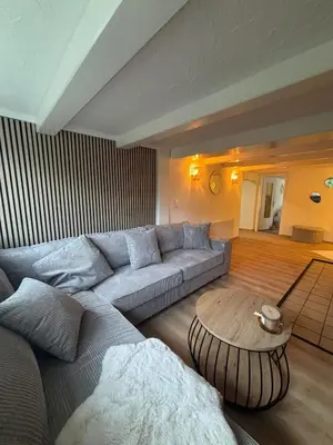 Ein Sitzbereich in der Unterkunft 115 qm Apartment für bis zu 8 Personen mit 4 Schlafzimmern