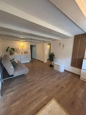 Ein Sitzbereich in der Unterkunft 115 qm Apartment für bis zu 8 Personen mit 4 Schlafzimmern