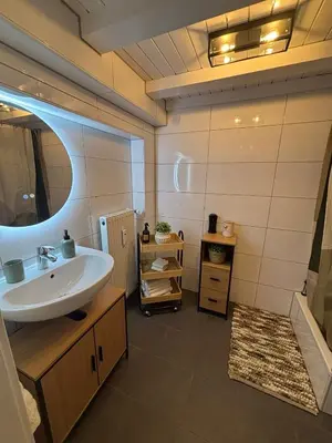 Ein Badezimmer in der Unterkunft 115 qm Apartment für bis zu 8 Personen mit 4 Schlafzimmern