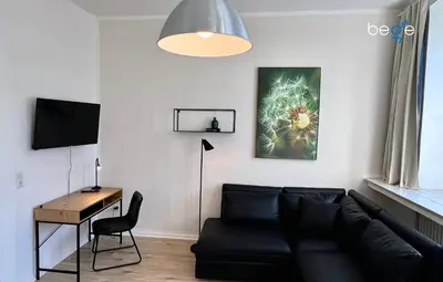 TV/Unterhaltungsangebot in der Unterkunft BEGE APARTMENTS DeskSide