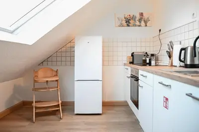 Küche/Küchenzeile in der Unterkunft JuPa Homes gemütliches DG Apartment