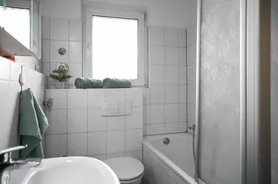 Ein Badezimmer in der Unterkunft JuPa Homes gemütliches DG Apartment