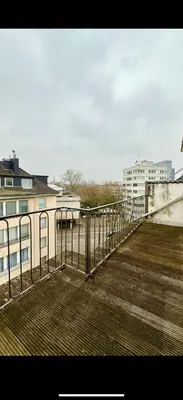 Ein Balkon oder eine Terrasse in der Unterkunft Dachnest Gemütliche Wohnung im Herzen Düsseldorf