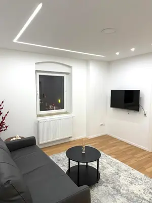 TV/Unterhaltungsangebot in der Unterkunft Moderne, neu möblierte Wohnung in zentraler Lage