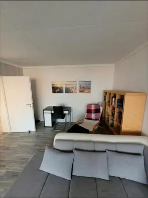 Ein Sitzbereich in der Unterkunft Sarra&Mo Ferienwohnung