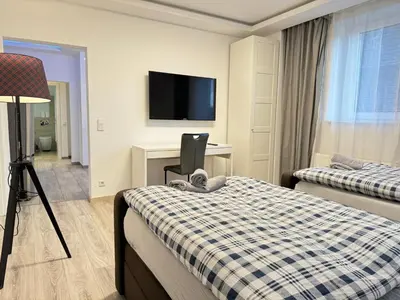 Ein Bett oder Betten in einem Zimmer der Unterkunft New Apartments - Free Parking - WiFi - Kitchen