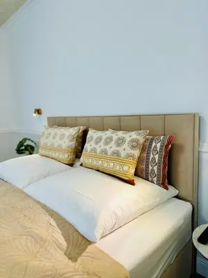 Ein Bett oder Betten in einem Zimmer der Unterkunft Large apartment with terrace - very central NEW
