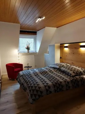 Ein Bett oder Betten in einem Zimmer der Unterkunft Stadt-Land-Bochum Stiepel