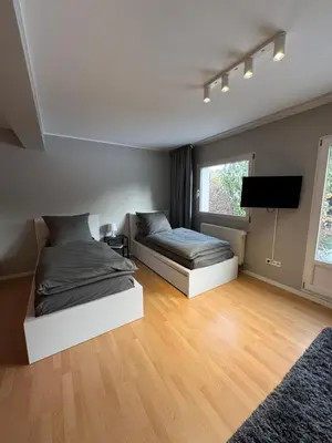 Ein Bett oder Betten in einem Zimmer der Unterkunft Fitzroy Apartment