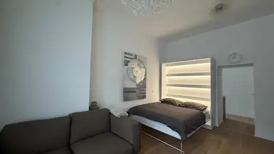 Ein Bett oder Betten in einem Zimmer der Unterkunft Modernes Design-Apartment in Duisburg-Rheinhausen