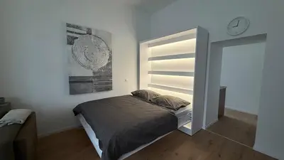 Ein Bett oder Betten in einem Zimmer der Unterkunft Modernes Design-Apartment in Duisburg-Rheinhausen