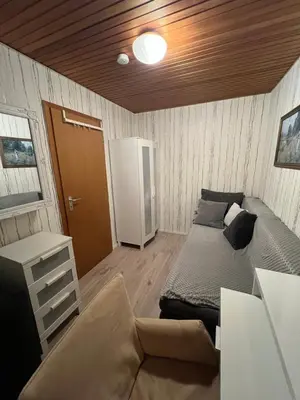 Ein Bett oder Betten in einem Zimmer der Unterkunft Möbliertes Haus mit Garten im Herzen von Moers