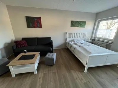Ein Bett oder Betten in einem Zimmer der Unterkunft Über dem Dörpken