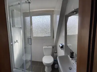 Ein Badezimmer in der Unterkunft Dachgeschosswohnung im 3-Städteeck