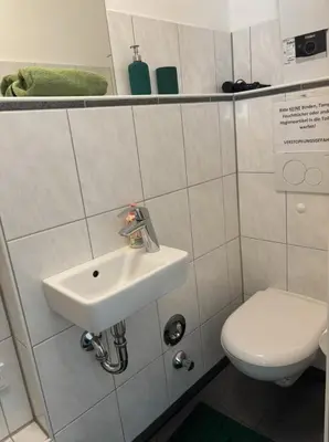 Ein Badezimmer in der Unterkunft Cozy Studio Apartment in Düsseldorf Altstadt