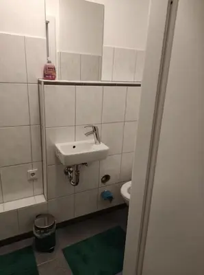 Ein Badezimmer in der Unterkunft Cozy Studio Apartment in Düsseldorf Altstadt
