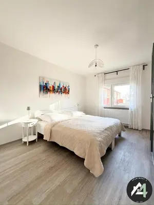 Ein Bett oder Betten in einem Zimmer der Unterkunft Apartment4