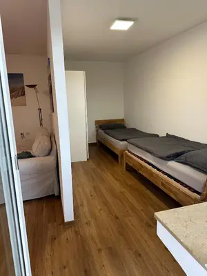 Ein Bett oder Betten in einem Zimmer der Unterkunft Business Apartment in Duisburg 400m weit von Hbf