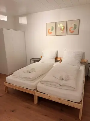 Ein Bett oder Betten in einem Zimmer der Unterkunft WhiteWood-Apartment Bottrop - Near Skihalle