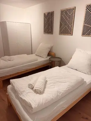 Ein Bett oder Betten in einem Zimmer der Unterkunft WhiteWood-Apartment Bottrop - Near Skihalle
