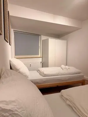 Ein Bett oder Betten in einem Zimmer der Unterkunft WhiteWood-Apartment Bottrop - Near Skihalle