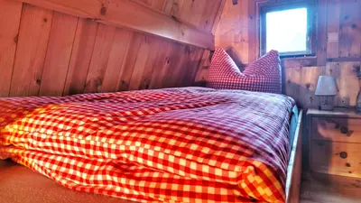 Ein Bett oder Betten in einem Zimmer der Unterkunft Finnhütte bei GRETA