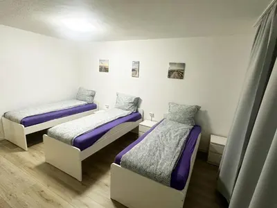 Ein Bett oder Betten in einem Zimmer der Unterkunft Apartments in Bergkamen