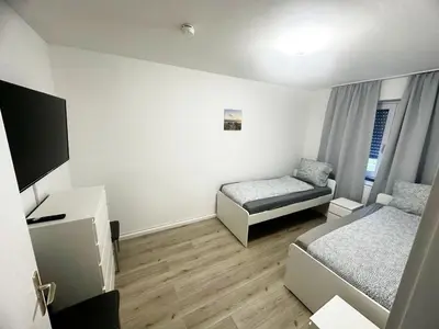 Ein Bett oder Betten in einem Zimmer der Unterkunft Apartments in Bergkamen