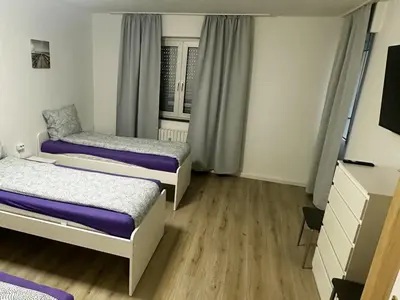 Ein Bett oder Betten in einem Zimmer der Unterkunft Apartments in Bergkamen