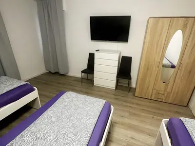 Ein Bett oder Betten in einem Zimmer der Unterkunft Apartments in Bergkamen