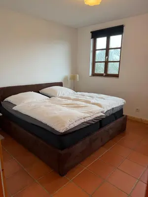 Ein Bett oder Betten in einem Zimmer der Unterkunft Scheune B7
