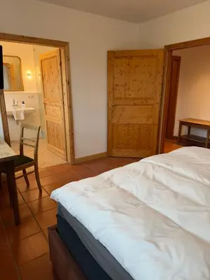 Ein Bett oder Betten in einem Zimmer der Unterkunft Scheune B7