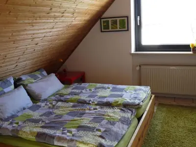 Ein Bett oder Betten in einem Zimmer der Unterkunft Apartment FEWOim Loftcharakter by Interhome