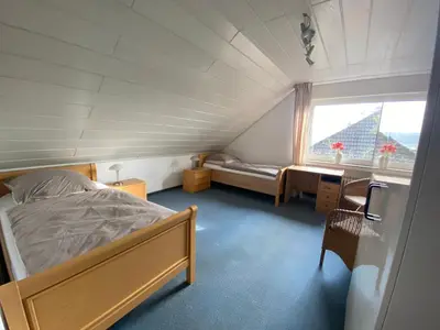 Ein Bett oder Betten in einem Zimmer der Unterkunft 3-Zimmer-Ferienwohnung