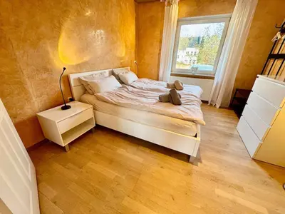Ein Bett oder Betten in einem Zimmer der Unterkunft Top ausgestattet 3,5 Zimmerwohnung in GE-Hessler