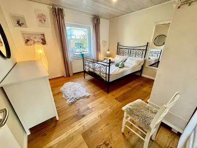Ein Bett oder Betten in einem Zimmer der Unterkunft Top ausgestattet 3,5 Zimmerwohnung in GE-Hessler