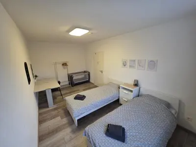 Ein Bett oder Betten in einem Zimmer der Unterkunft 3-Zimmer Wohnung - 4 OG