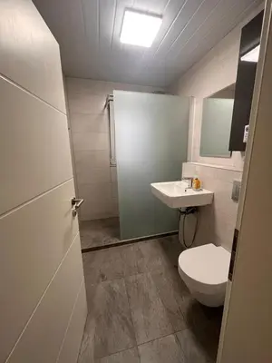 Ein Badezimmer in der Unterkunft Einzelzimmer für bis zu 2 Personen - 4 OG