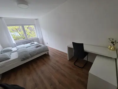 Ein Bett oder Betten in einem Zimmer der Unterkunft 3-Zimmer Wohnung - 3 OG