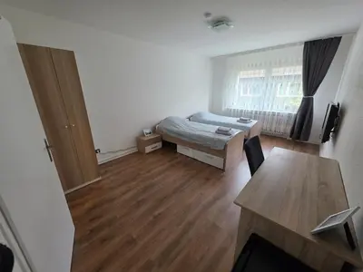 Ein Bett oder Betten in einem Zimmer der Unterkunft 3-Zimmer Wohnung - 3 OG