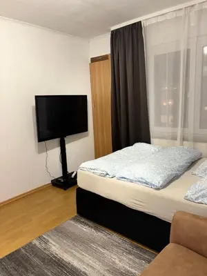 Ein Bett oder Betten in einem Zimmer der Unterkunft Komfortwohnung mit zwei Schlafzimmern in Barmen