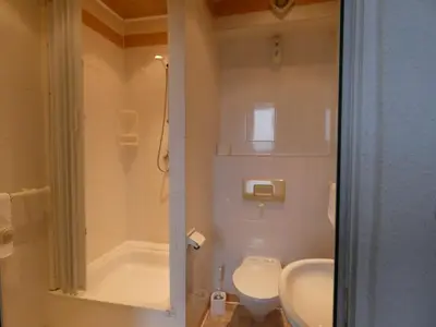 Ein Badezimmer in der Unterkunft Park Hotel