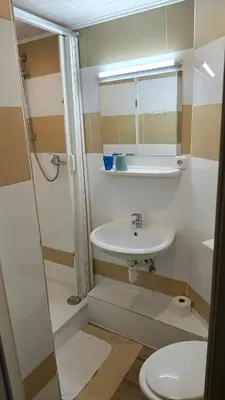Ein Badezimmer in der Unterkunft Park Hotel