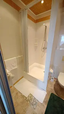 Ein Badezimmer in der Unterkunft Park Hotel