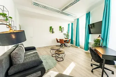 TV/Unterhaltungsangebot in der Unterkunft Modernes Apartment für 5 Personen mit Privatüarkplatz - Wlan und Kaffeevollautomat