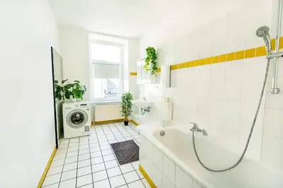 Ein Badezimmer in der Unterkunft Modernes Apartment für 5 Personen mit Privatüarkplatz - Wlan und Kaffeevollautomat