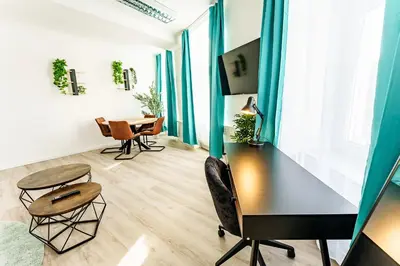 TV/Unterhaltungsangebot in der Unterkunft Modernes Apartment für 5 Personen mit Privatüarkplatz - Wlan und Kaffeevollautomat