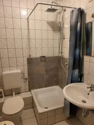 Ein Badezimmer in der Unterkunft Hotel Schlaun