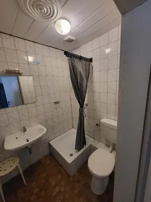 Ein Badezimmer in der Unterkunft Hotel Schlaun